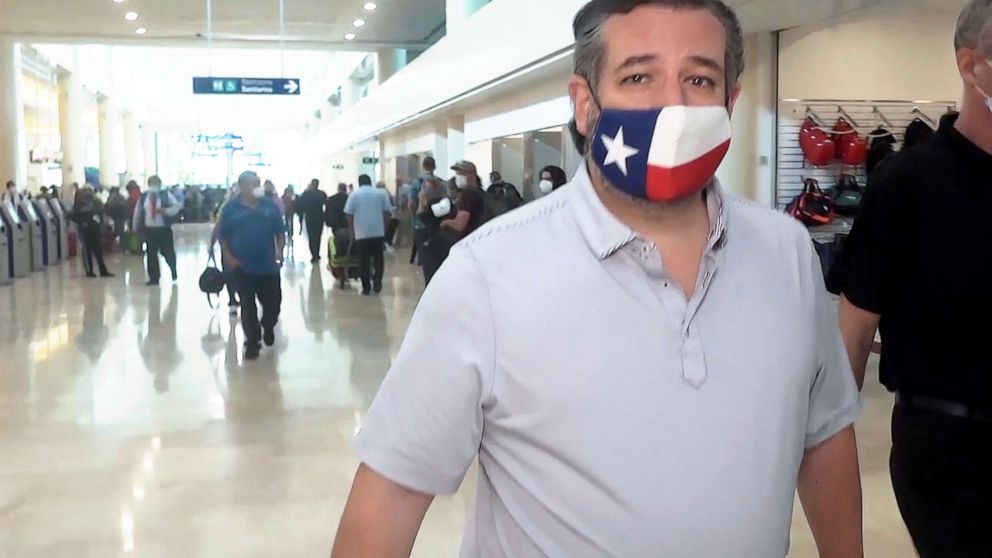PHOTO:Sen. Ted Cruz, R-Texas, walks to check in for his flight back to the U.S., at Cancun International Airport in Cancun, Mexico, Feb. 18, 2021.