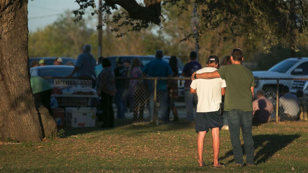 PHOTO: People comfort each other at a community center near the scene of a deadly shooting at the First Baptist Church in Sutherland Springs, Texas, Nov. 5, 2017. 