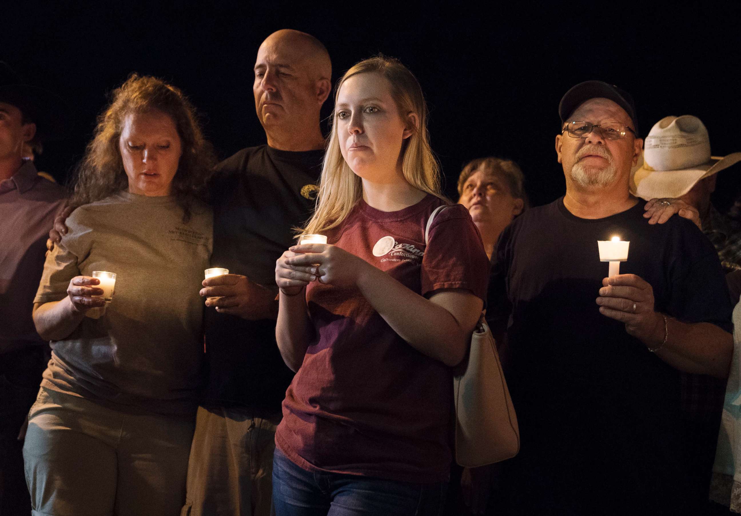 PHOTO: Mourners participate in a candlelight vigil held for the victims of a fatal shooting at the First Baptist Church of Sutherland Springs, Sunday, Nov. 5, 2017, in Sutherland Springs, Texas.