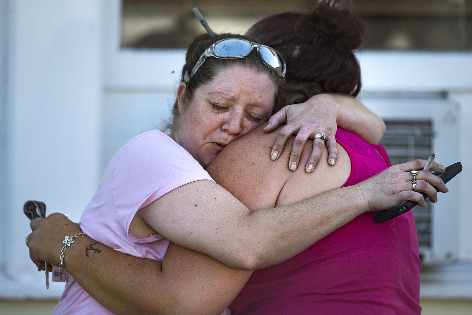 PHOTO: Carrie Matula embraces a woman after a fatal shooting at the First Baptist Church in Sutherland Springs, Texas, Nov. 5, 2017. 