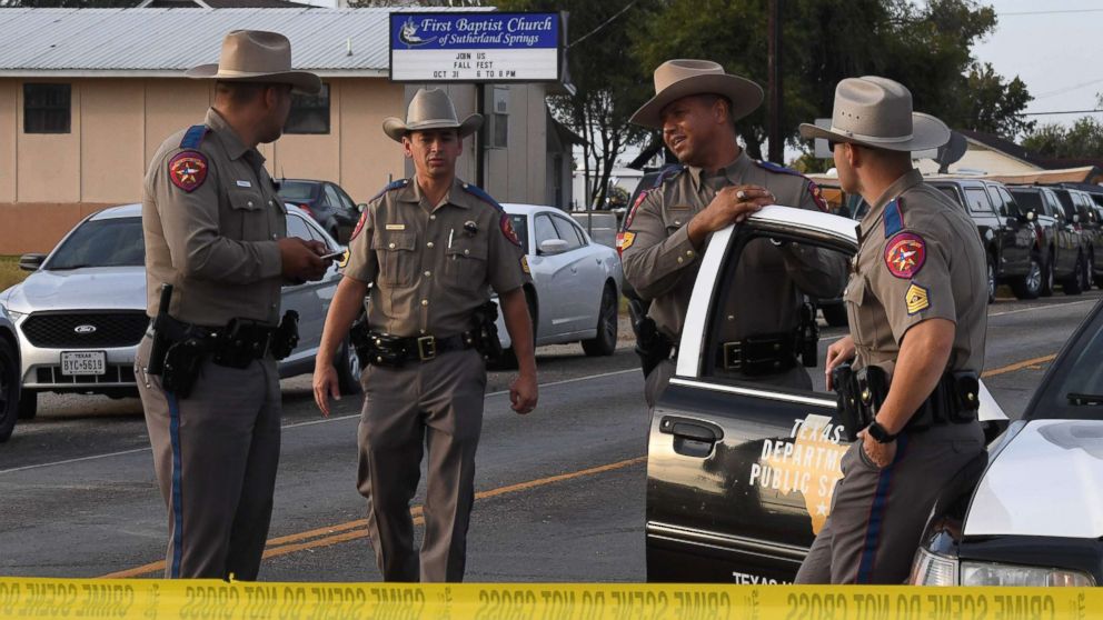 State troopers guard the entrance to the First Baptist Church after a mass shooting that killed 26 people in Sutherland Springs, Texas, Nov. 6, 2017.