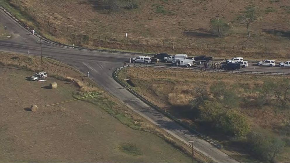 PHOTO: Police vehicles gather at the scene of the SUV where the suspected shooter who opened fire at First Baptist Church of Sutherland Springs, Texas, drove off the road and was found dead on Nov. 5, 2017. 