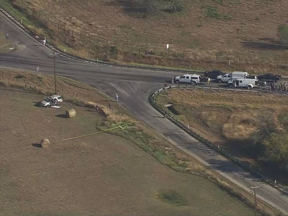 PHOTO: Police vehicles gather at the scene of the SUV where the suspected shooter who opened fire at First Baptist Church of Sutherland Springs, Texas, drove off the road and was found dead on Nov. 5, 2017.