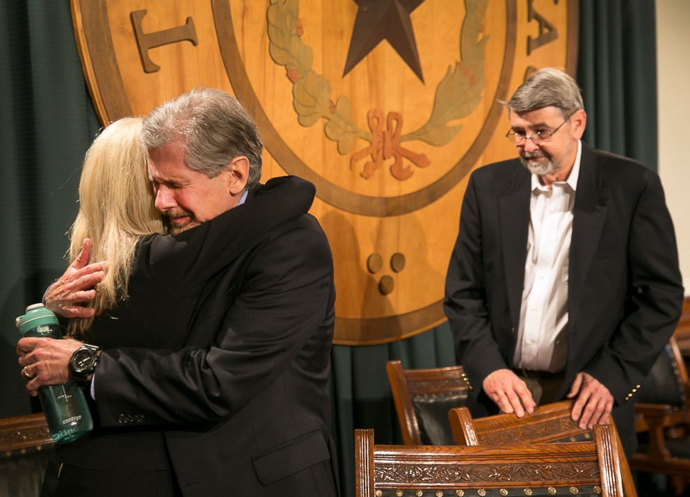 PHOTO: Kent Whitaker embraces his wife Tanya after reacting to the an email from the Texas Board of Pardons and Paroles which voted unanimously to recommend clemency for death row inmate Thomas Whitaker, Feb. 20, 2018, in Austin, Texas.