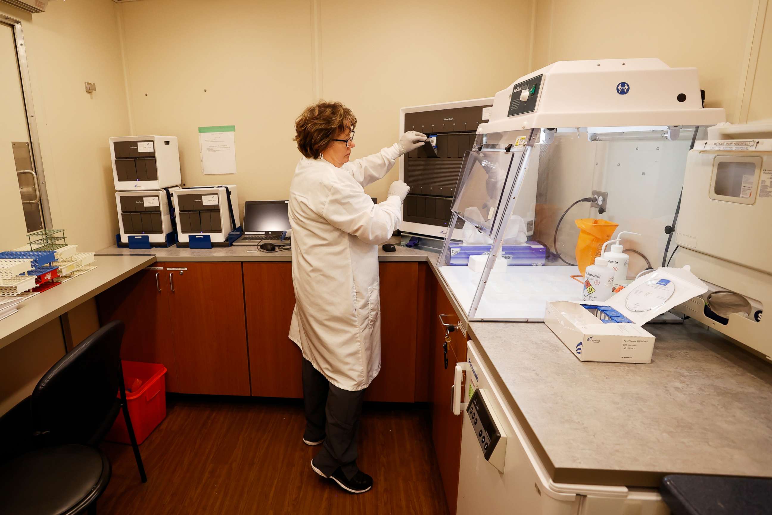 PHOTO: Sanford Health Regulatory Manager Valerie Hieb shows how testing is done at a mobile testing unit, June 9, 2020, in Fort Worth, Texas.
