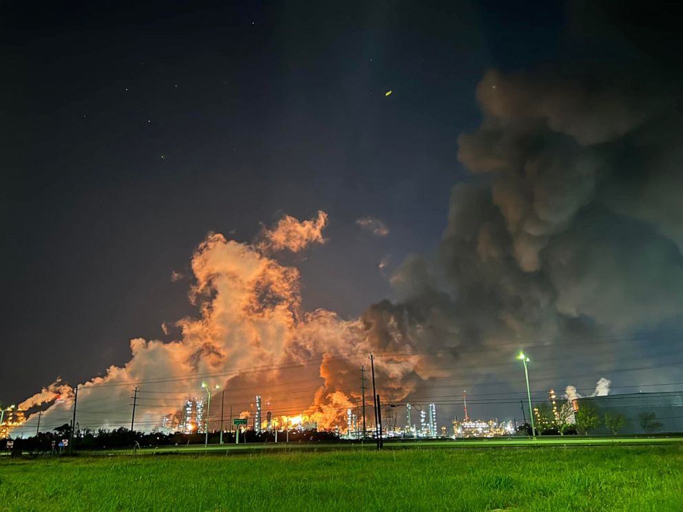 PHOTO: Smoke rises from Exxon Mobil's Baytown plant, about 25 miles east of Houston, following an incident that local sheriffs called a 'major industrial accident,' on Dec. 23, 2021.