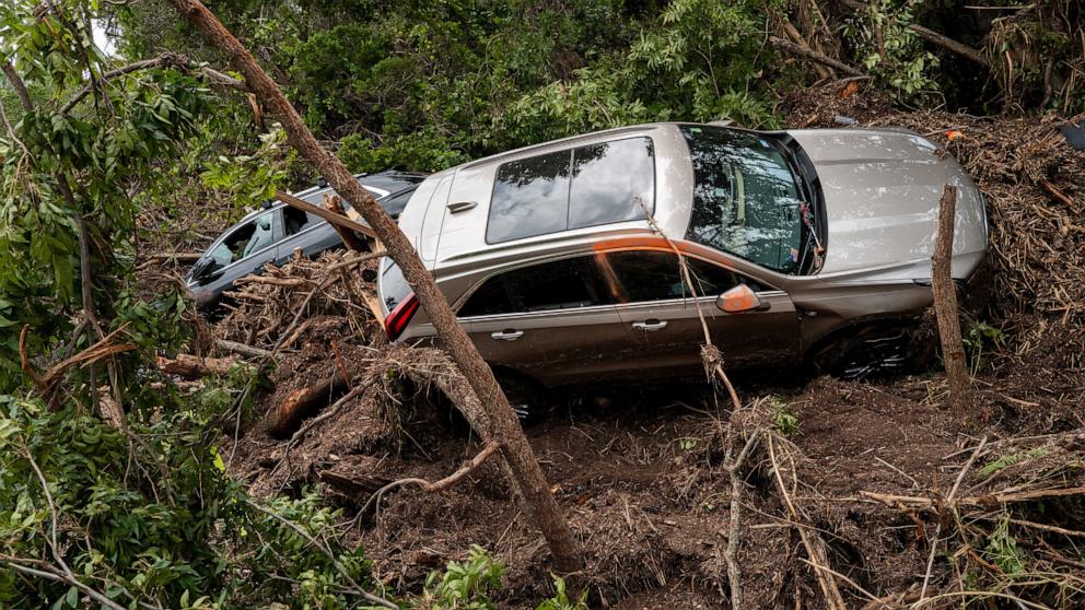 PHOTO: Vehicles are seen stuck in debris near the Guadalupe River, July 7, 2025 in Hunt, Texas.