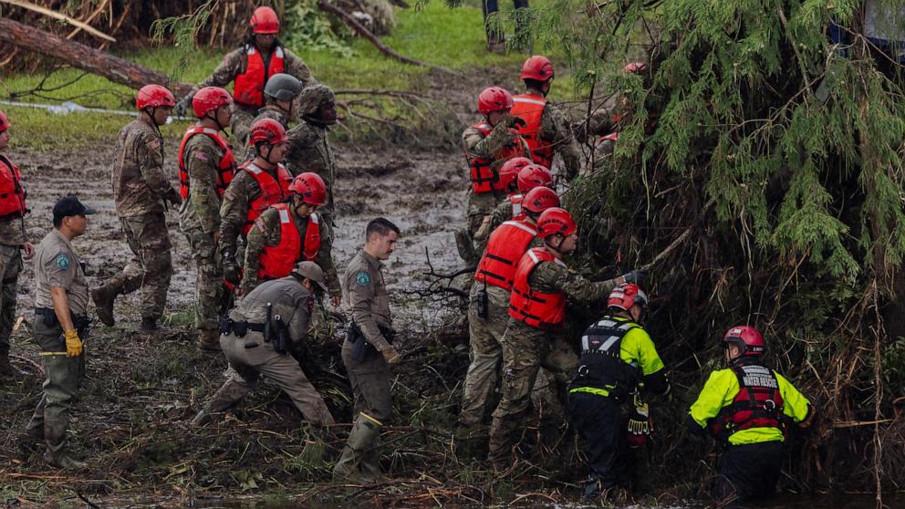PHOTO: Search and recovery workers dig through debris looking for any survivors or remains of people swept up in the flash flooding at Camp Mystic, July 6, 2025 in Hunt, Texas. 