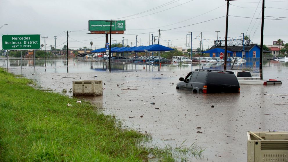 First day of summer brings flooding to Texas, extreme heat in the West