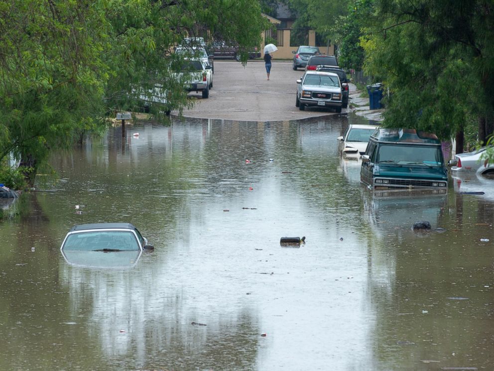 First day of summer brings flooding to Texas, extreme heat in the West