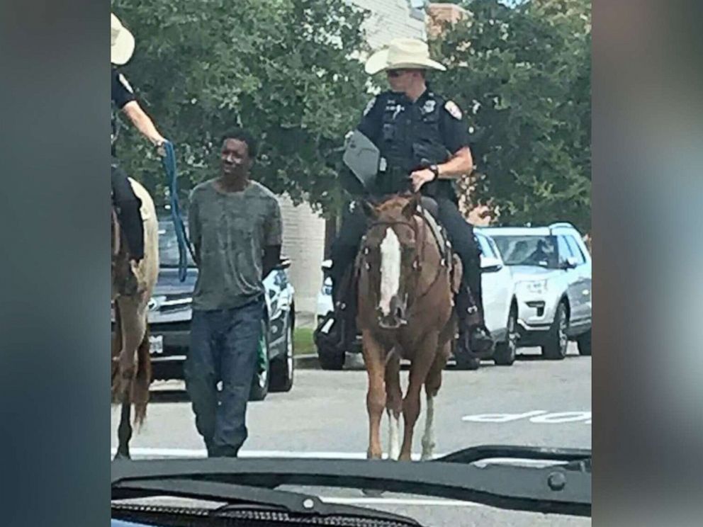 Texas Police Apologize For Photo Of Officers On Horseback Leading ...