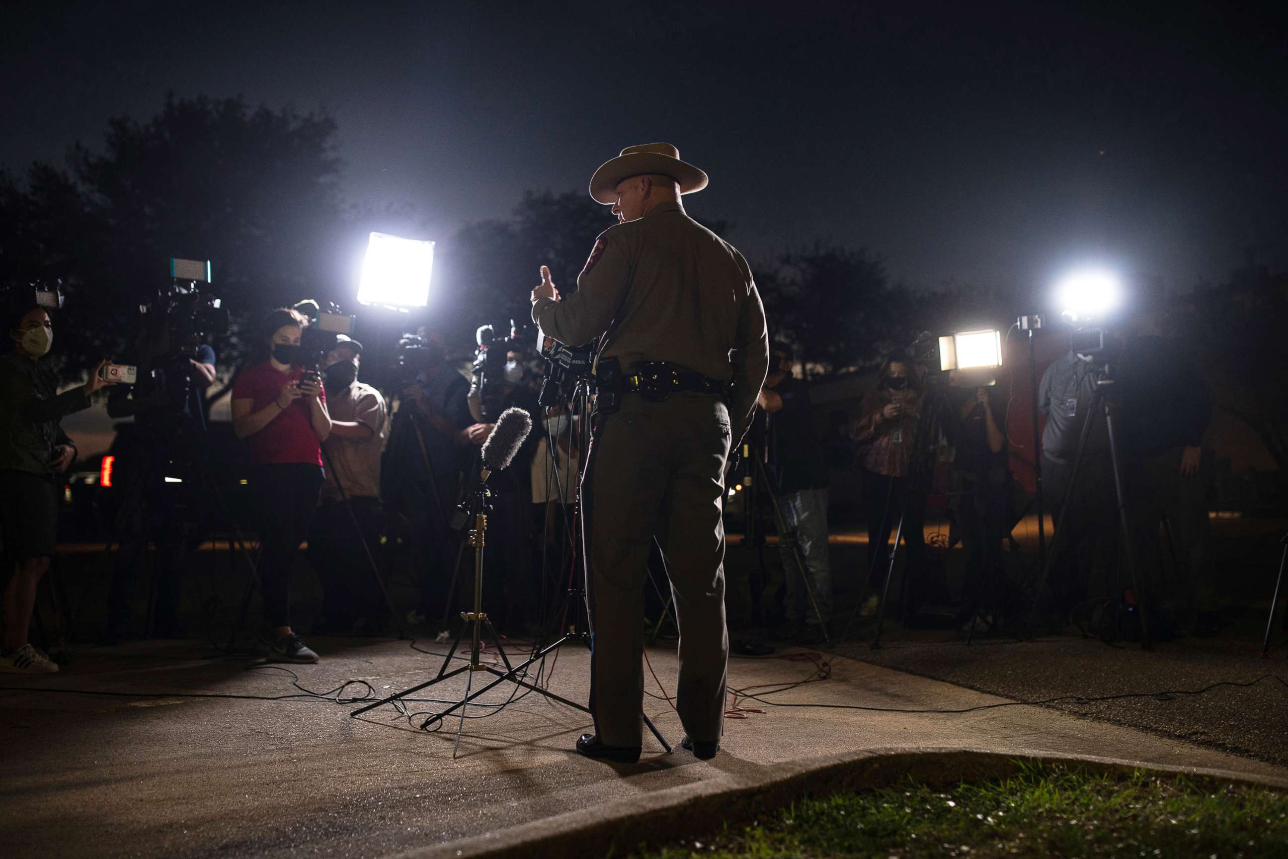 PHOTO: Texas Department of Public Safety spokesperson Lt. Craig Cummings speaks to members of the media outside of the hospital where people wounded during a shooting at Kent Moore Cabinets are being treated, April 8, 2021 in Bryan, Texas.