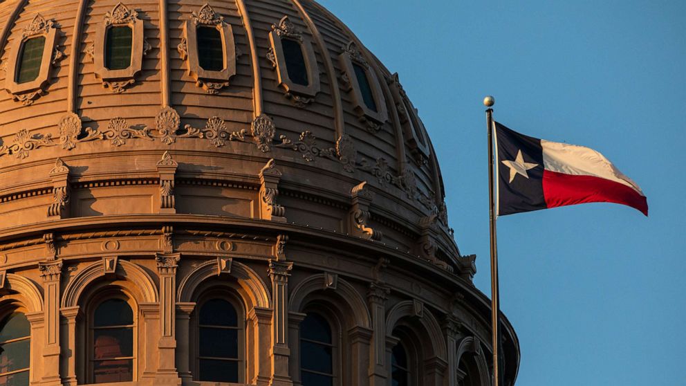 PHOTO: The Texas flag flies over the State Capitol in Austin, Sept. 20, 2021.