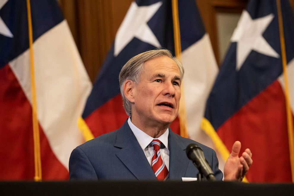 PHOTO: Texas Governor Greg Abbott announces the reopening of more Texas businesses during the COVID-19 pandemic at a press conference at the Texas State Capitol in Austin on May 18, 2020. 