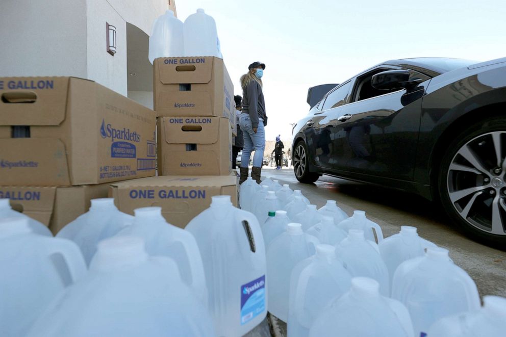 PHOTO: Volunteers prepare to hand out water during a water distribution event at the Fountain Life Center, Feb. 20, 2021, in Houston, Texas.