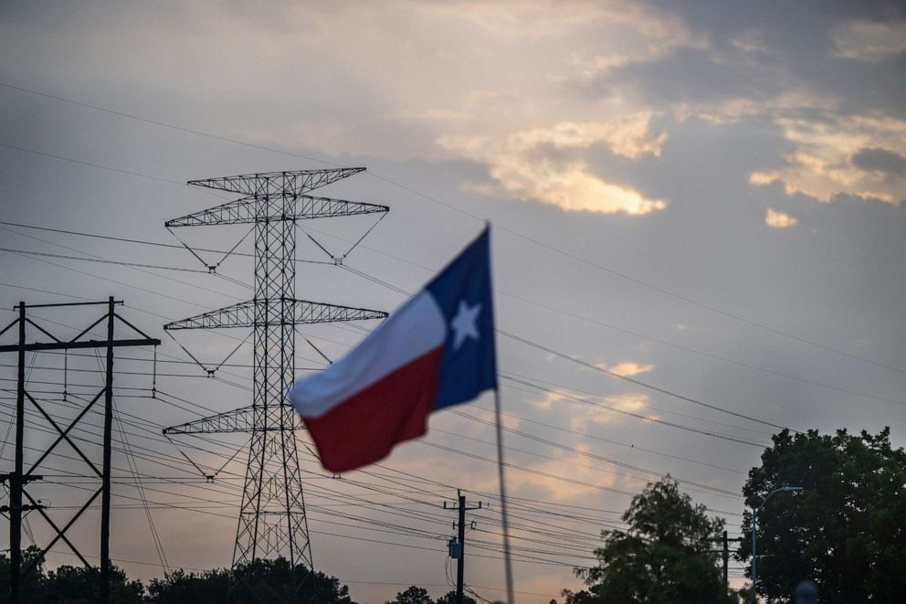 PHOTO: A transmission tower is seen on July 11, 2022, in Houston. ERCOT is urging Texans to voluntarily conserve power today, due to extreme heat potentially causing rolling blackouts. ERCOT has also projected there to be no blackouts this week.