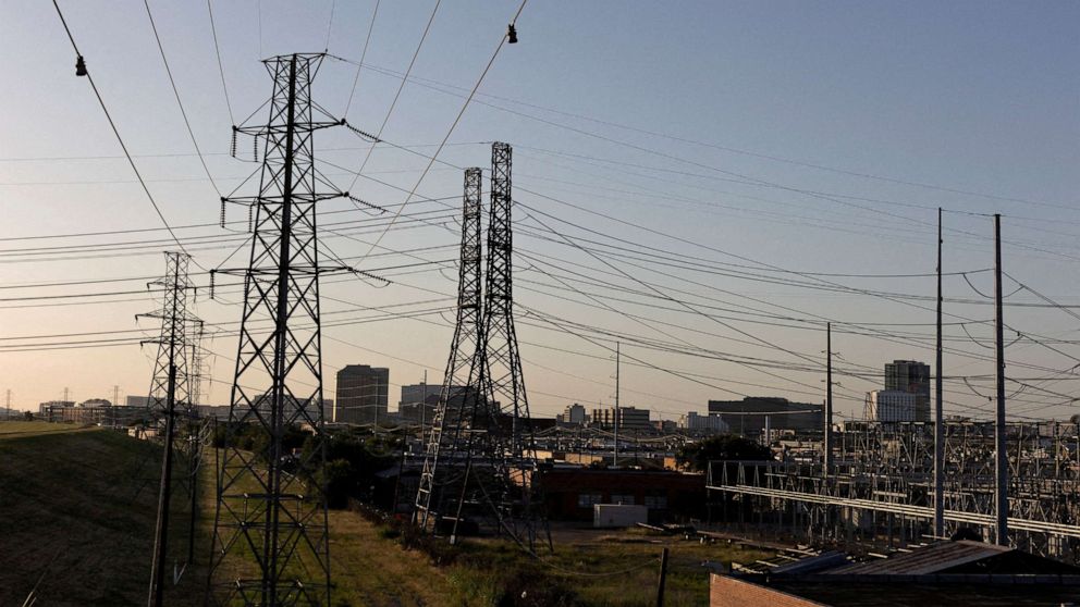 PHOTO: Power lines are seen during a heat wave with temperatures expected to reach 102 F (39 C) in Dallas, Texas on June 12, 2022.