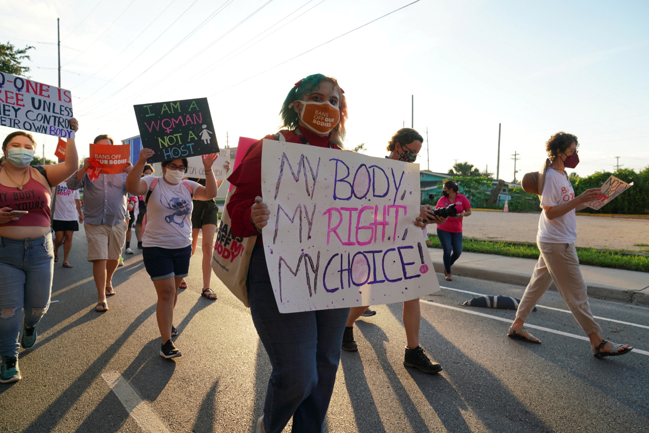 PHOTO: Supporters of reproductive choice take part in the nationwide Women's March, held after Texas rolled out a near-total ban on abortion procedures and access to abortion-inducing medications, in Brownsville, Texas, Oct. 2, 2021.