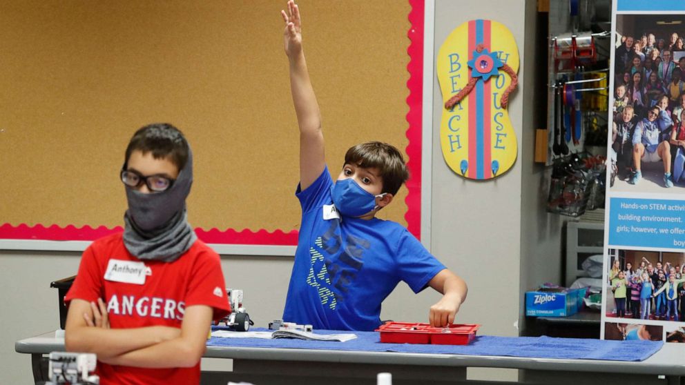 PHOTO: Amid concerns of the spread of COVID-19, students wear masks in the classroom during a summer STEM camp at Wylie High School, July 14, 2020, in Wylie, Texas. 