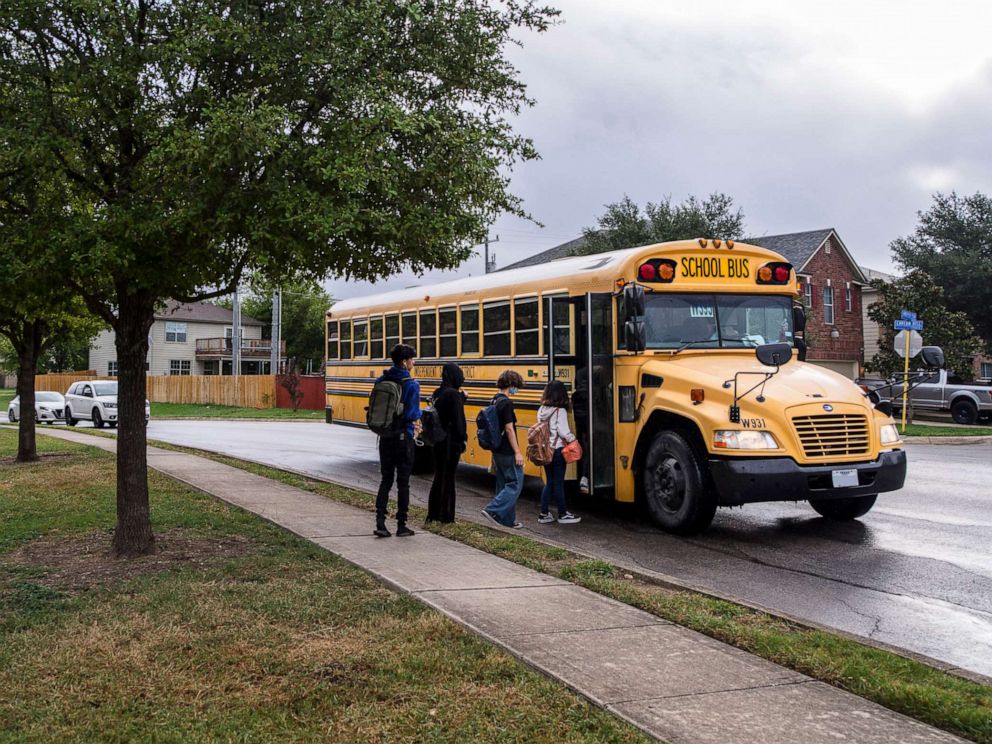 PHOTO: In this Sept. 13, 2021, file photo, a school bus picks up children on the way to school in San Antonio, Texas.