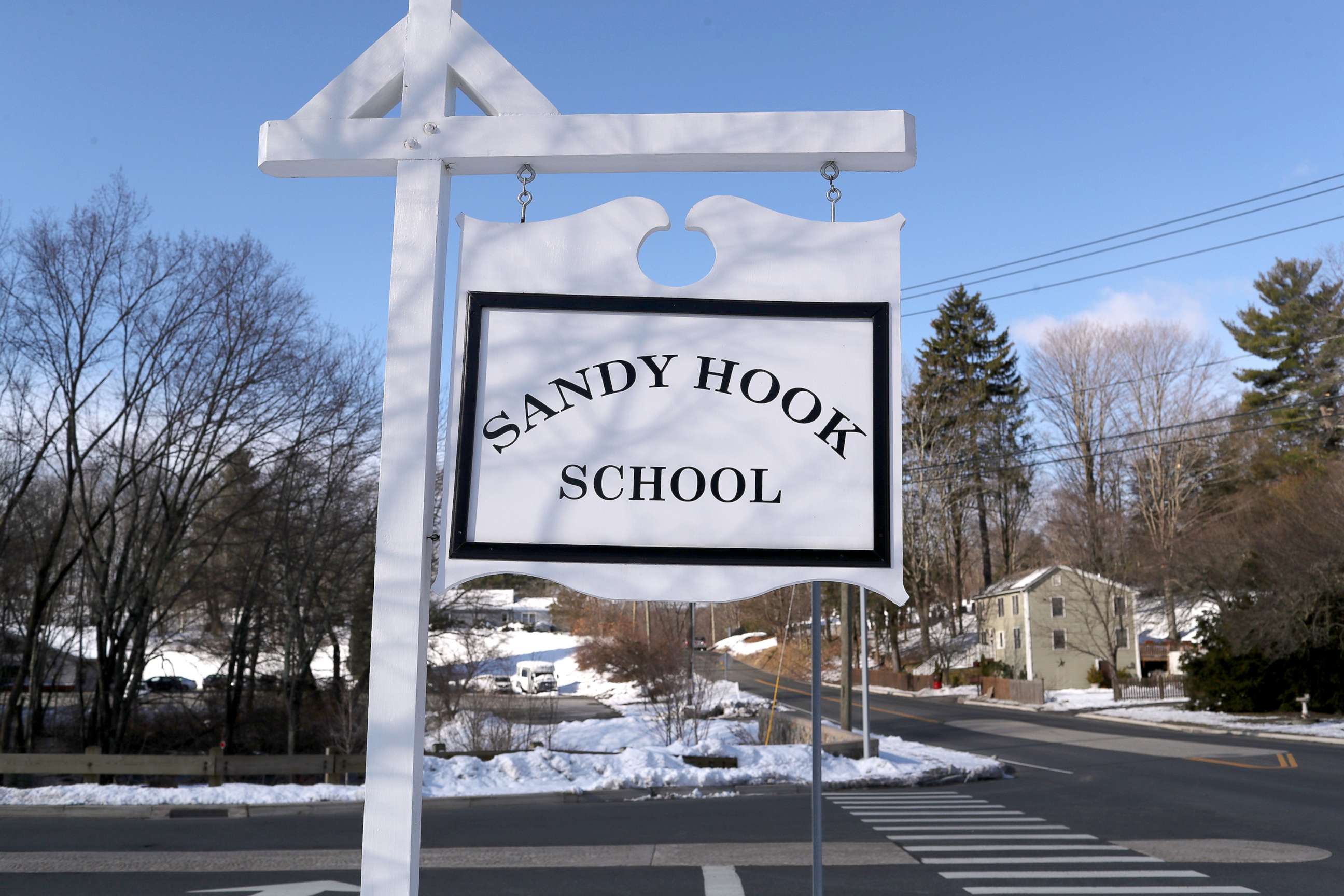 PHOTO: A sign stands near the site of the Sandy Hook school shooting in Sandy Hook, Conn., March 14, 2018. 