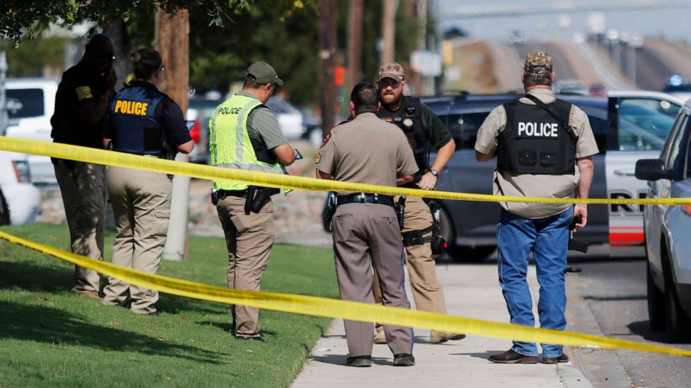 PHOTO: Authorities cordon off a part of the sidewalk in Odessa, Texas, after a mass shooting on Aug. 31, 2019.