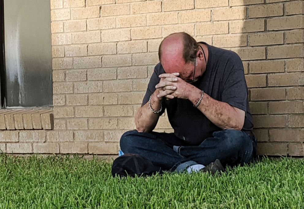 PHOTO: A man prays outside of the Medical Center Hospital Emergency room in Odessa, Texas, Aug. 31, 2019, following a shooting in the area of Odessa and Midland.