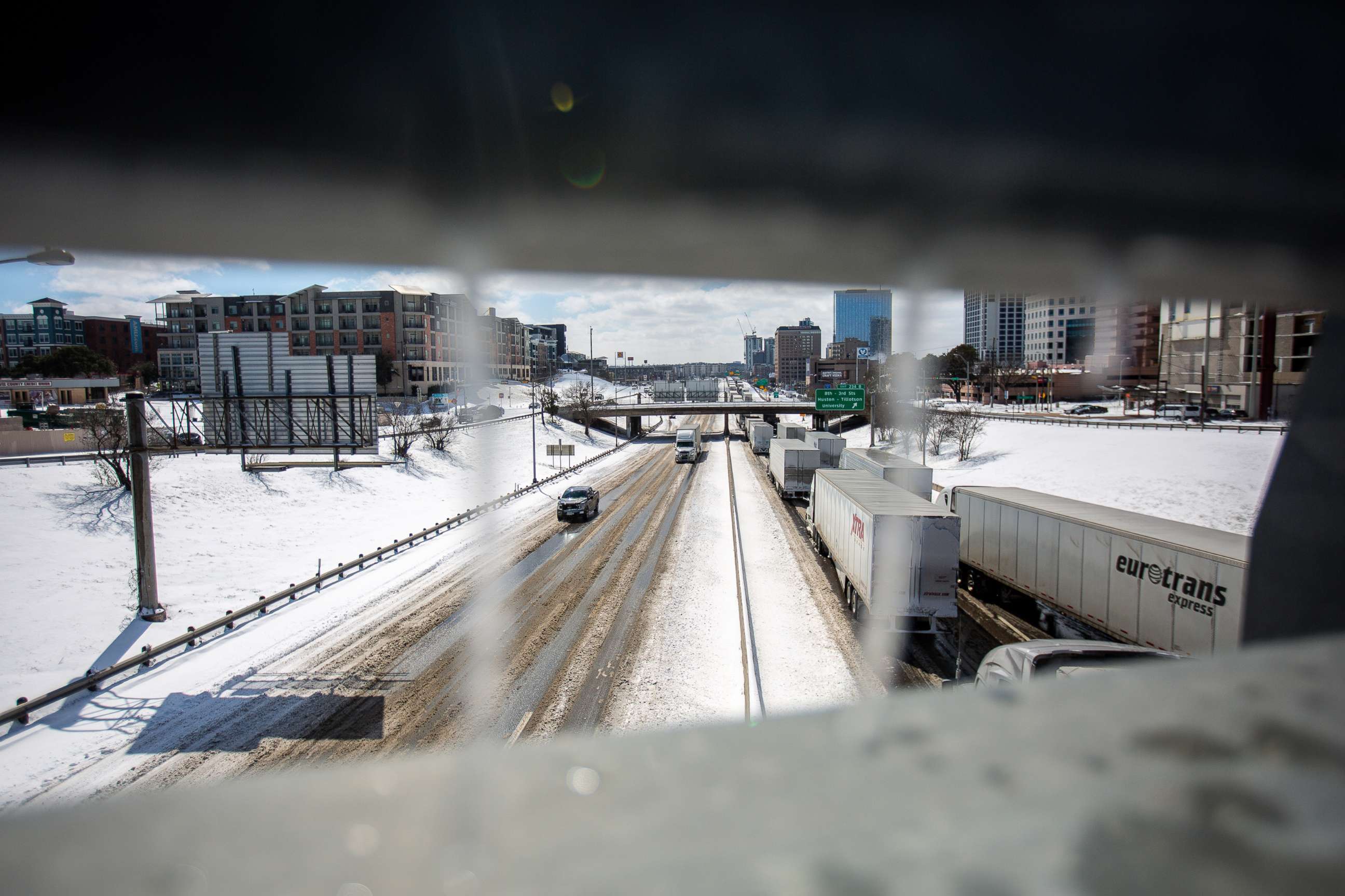 PHOTO: Cars drive Northbound on a snow covered I-35 on Feb. 15, 2021, in Austin, Texas.
