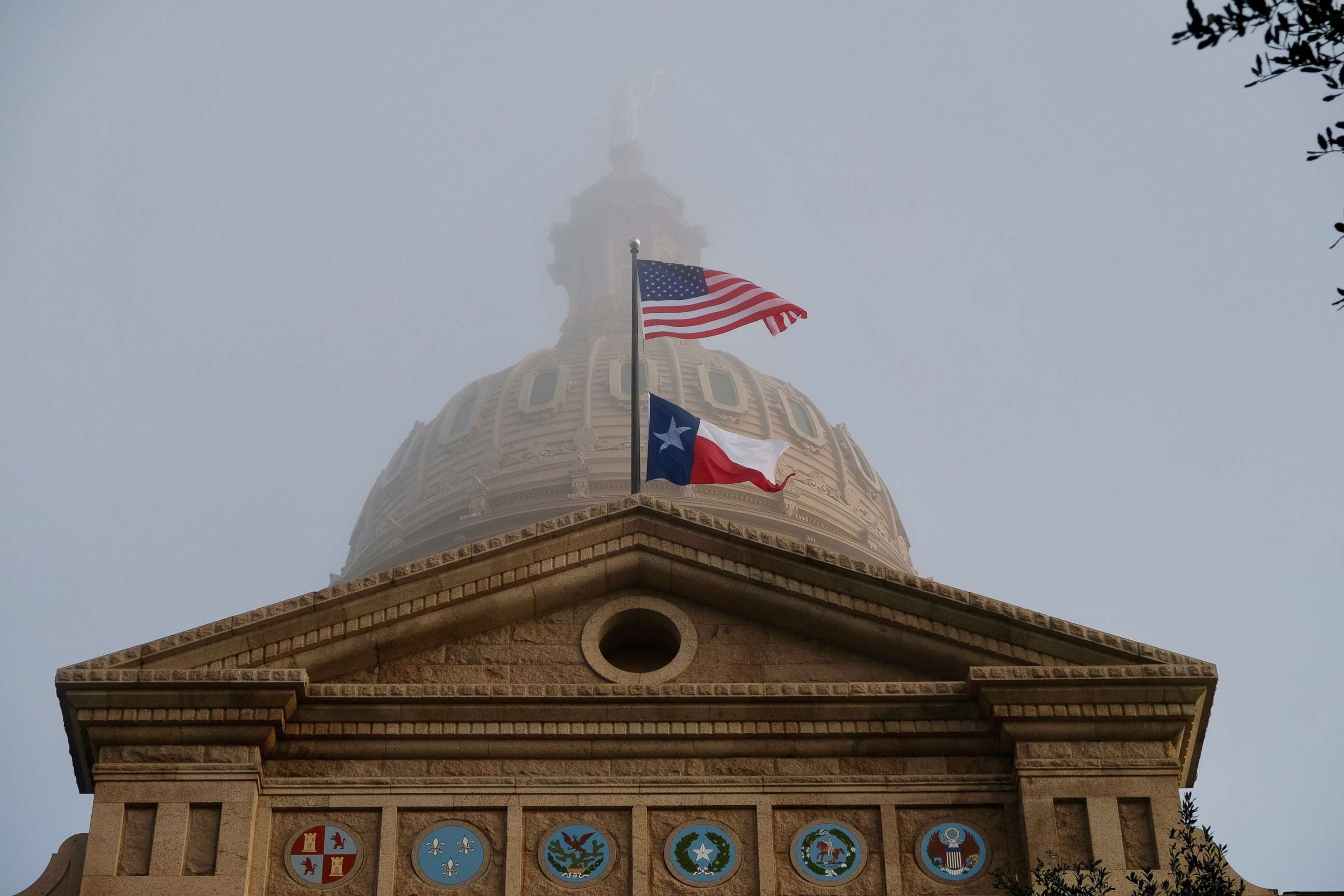 PHOTO: Flags fly in front of the Texas Capitol dome on Jan. 8, 2019, in Austin, Texas.