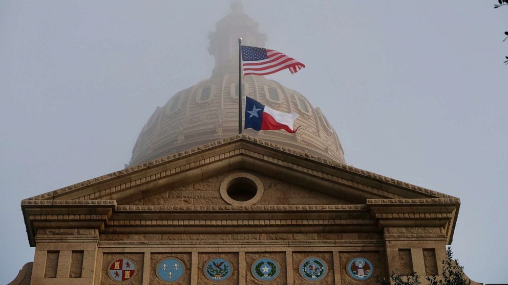 PHOTO: Flags fly in front of the Texas Capitol dome on Jan. 8, 2019, in Austin, Texas.