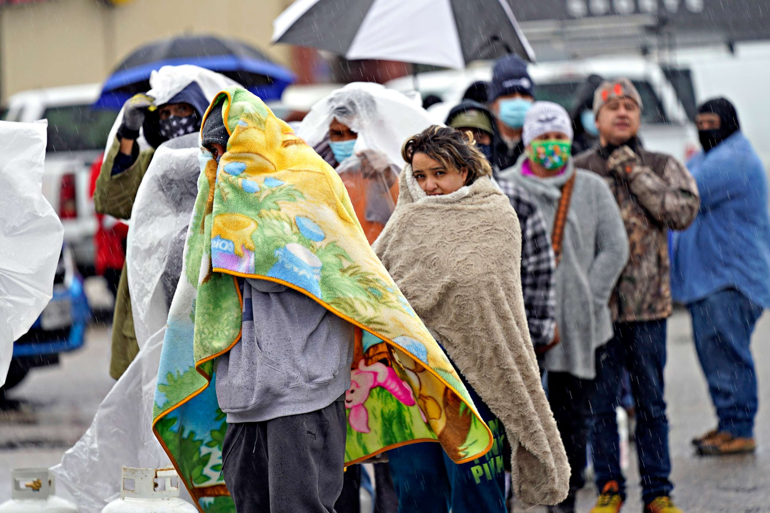 PHOTO: People wait in line to fill propane tanks, Feb. 17, 2021, in Houston.