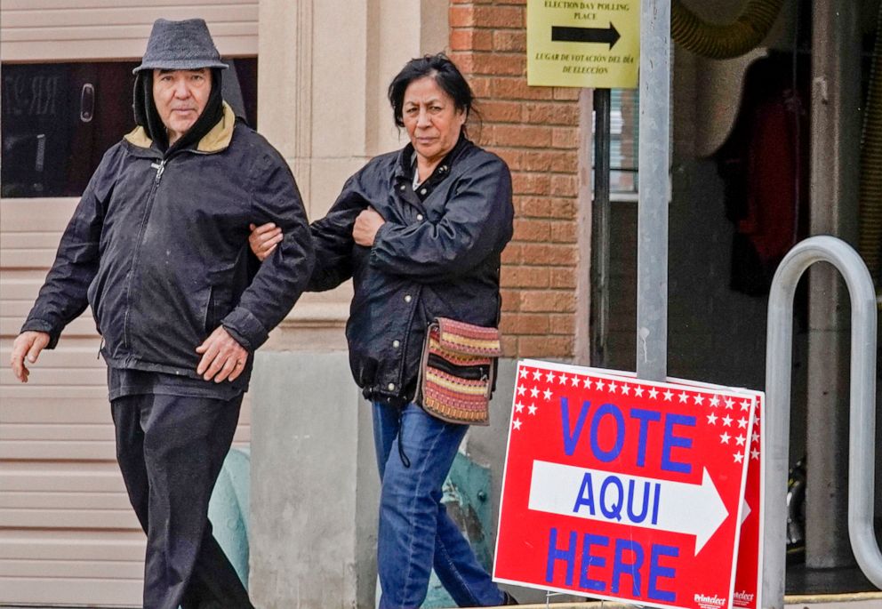 PHOTO: Julio Villalobos and Lucy Martinez Aguirre leave El Paso Fire Station 3 after casting their votes in the presidential primary in El Paso, Texas on Super Tuesday, March 3, 2020. 