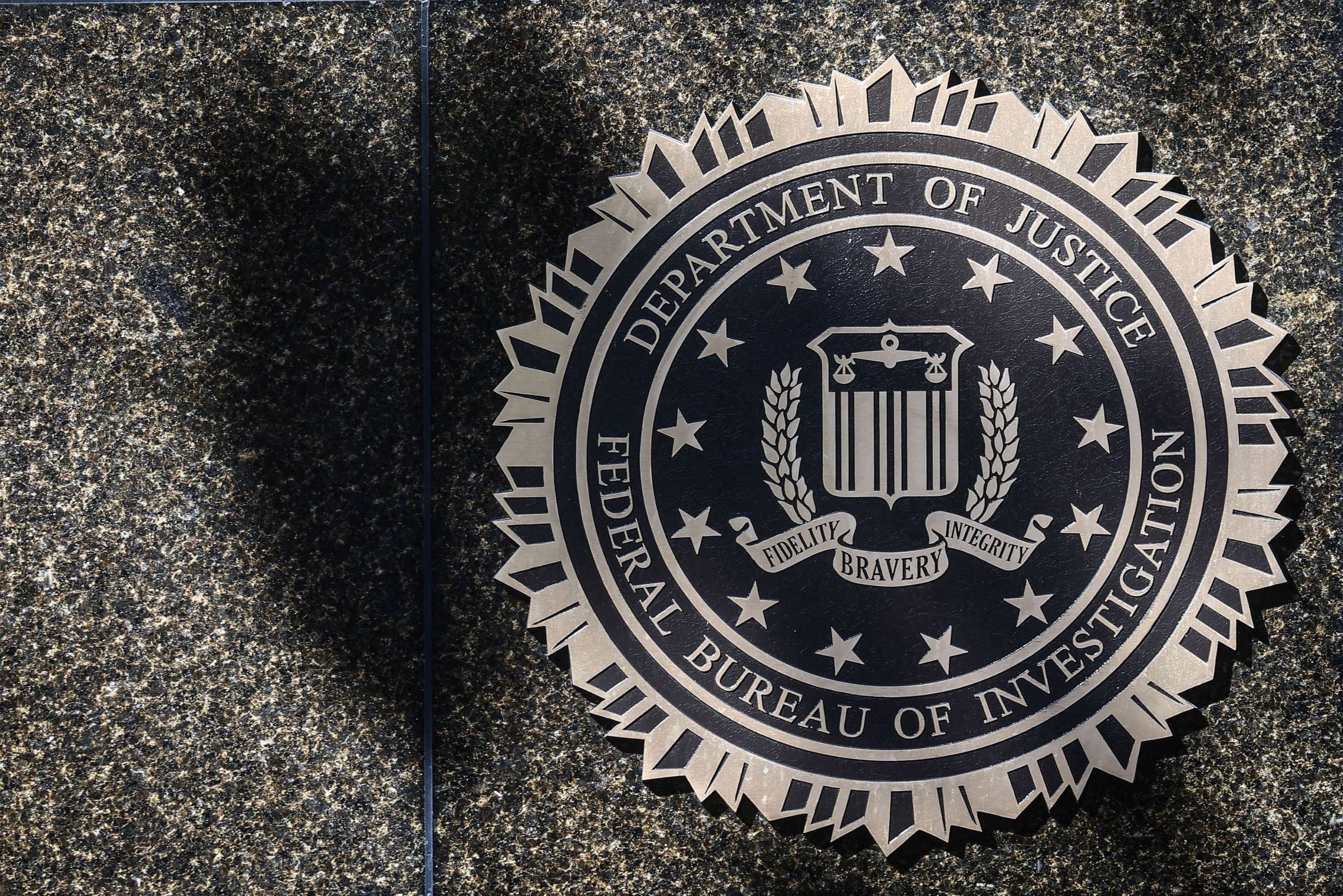 PHOTO: FILE - Federal Bureau Of Investigation emblem is seen on the headquarters building in Washington D.C., Oct. 20, 2022.