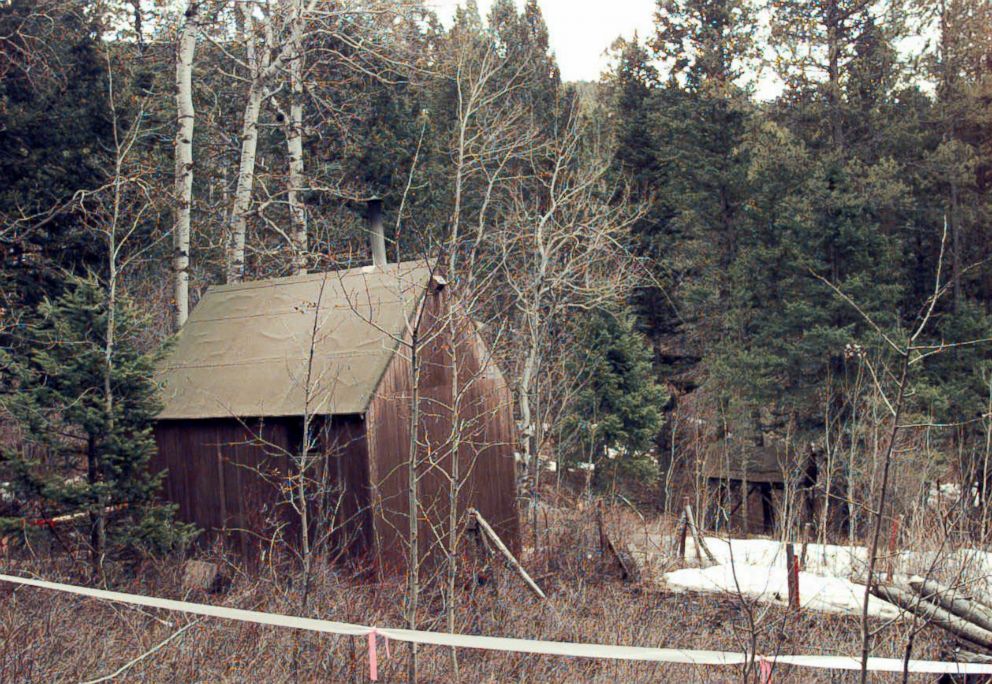 PHOTO: The cabin of suspected Unabomber Theodore Kaczynski, partially surrounded by white, plastic tape, sits at the end of a muddy, private road, hidden in a wooded setting about 300 yards from the nearest neighbor in Lincoln, Mont., April 6, 1996.