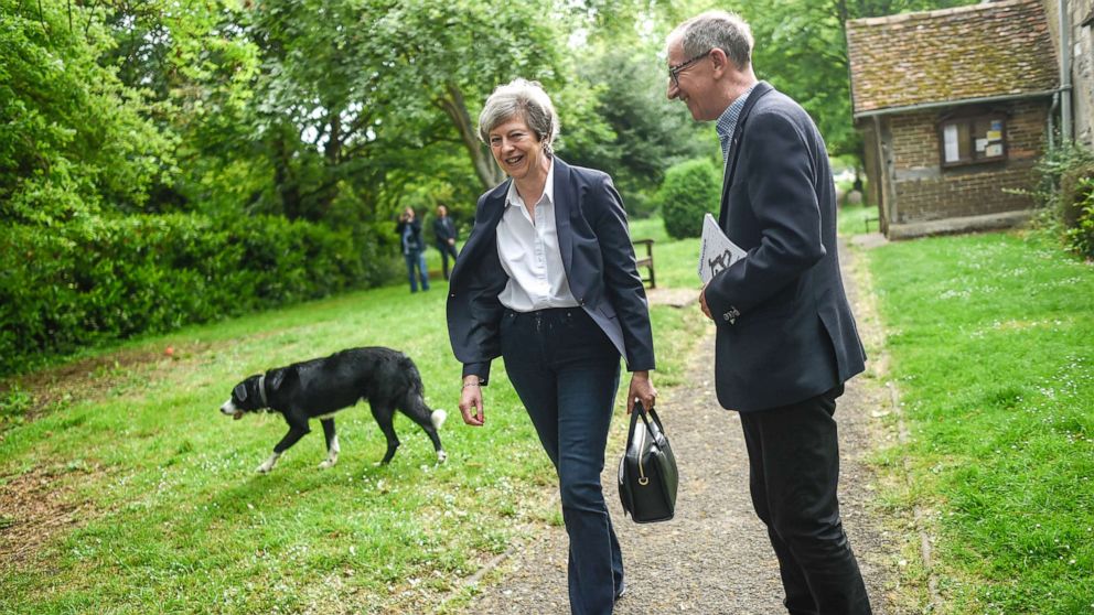 PHOTO: British Prime Minister Theresa May and her husband Philip May leave church, May 26, 2019, in Aylesbury, England. 