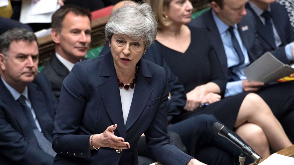 Britain's Prime Minister Theresa May stands to talk to lawmakers inside the House of Commons parliament in London, March 27, 2019.