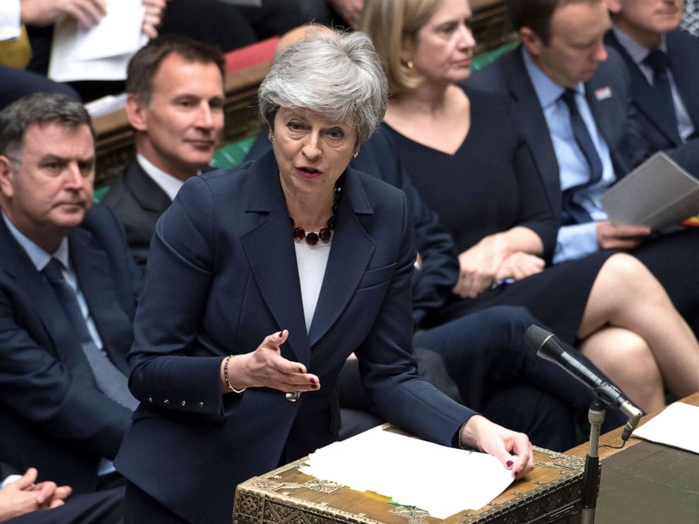 PHOTO: Britain's Prime Minister Theresa May stands to talk to lawmakers inside the House of Commons parliament in London, March 27, 2019.