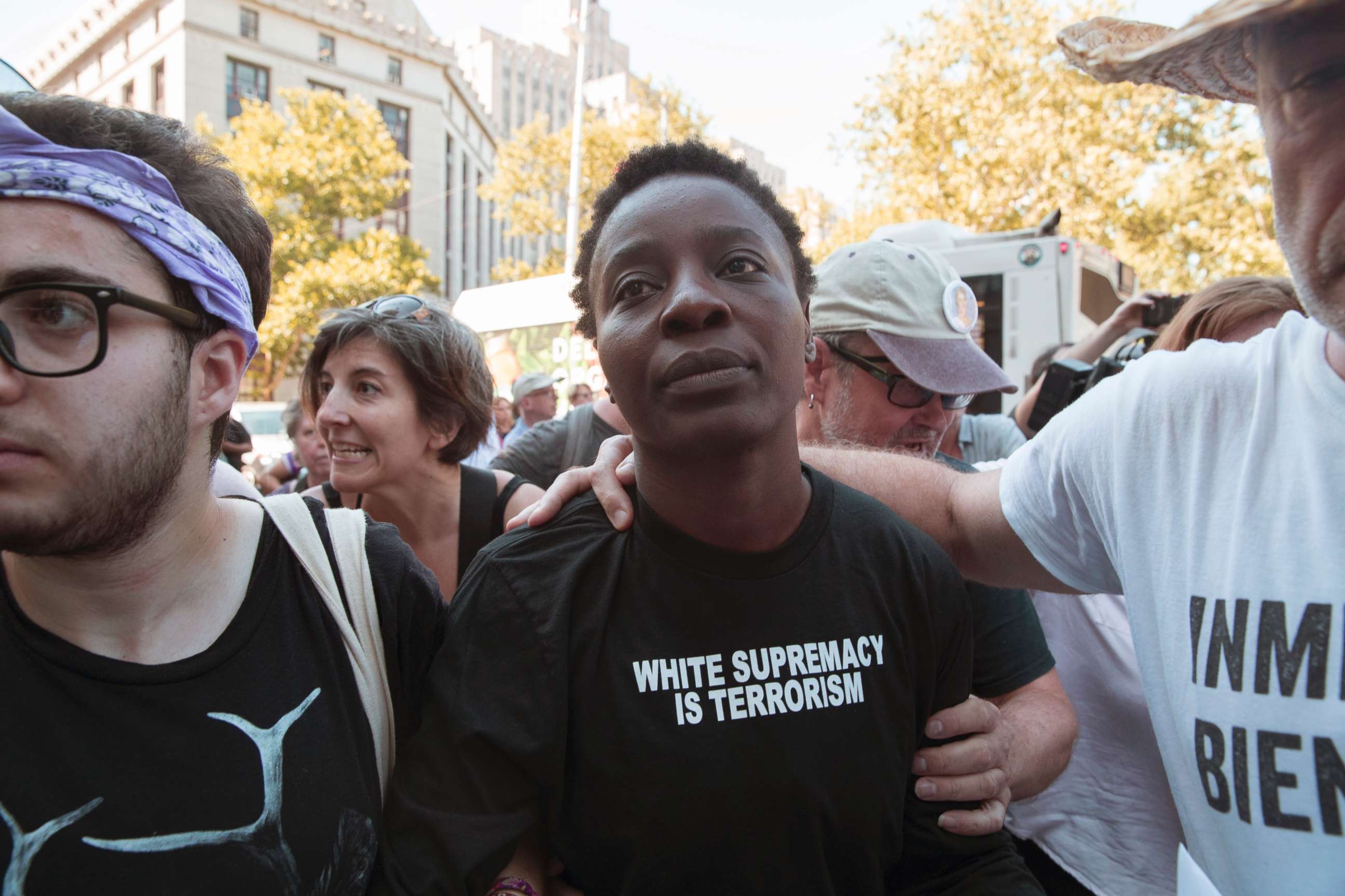 PHOTO: Therese Okoumou is surrounded by supporters as she leaves Federal court, Thursday, July 5, 2018, in New York.