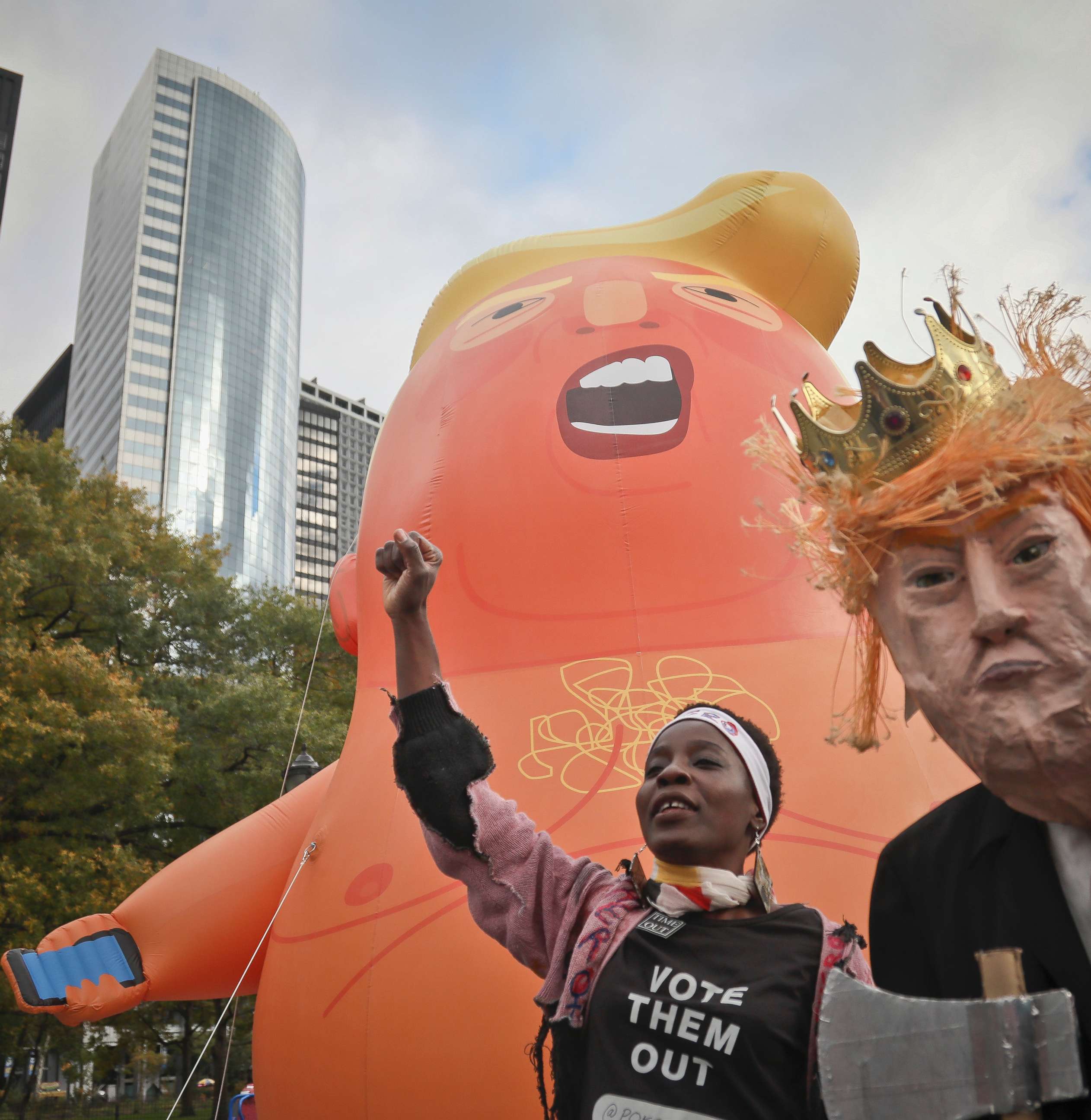 PHOTO: Therese Okoumou joins a protest calling for the impeachment of the president during a rally displaying a 20-foot helium-filled balloon parody of Trump known as "Baby Trump Balloon," Oct. 28, 2018, in New York.