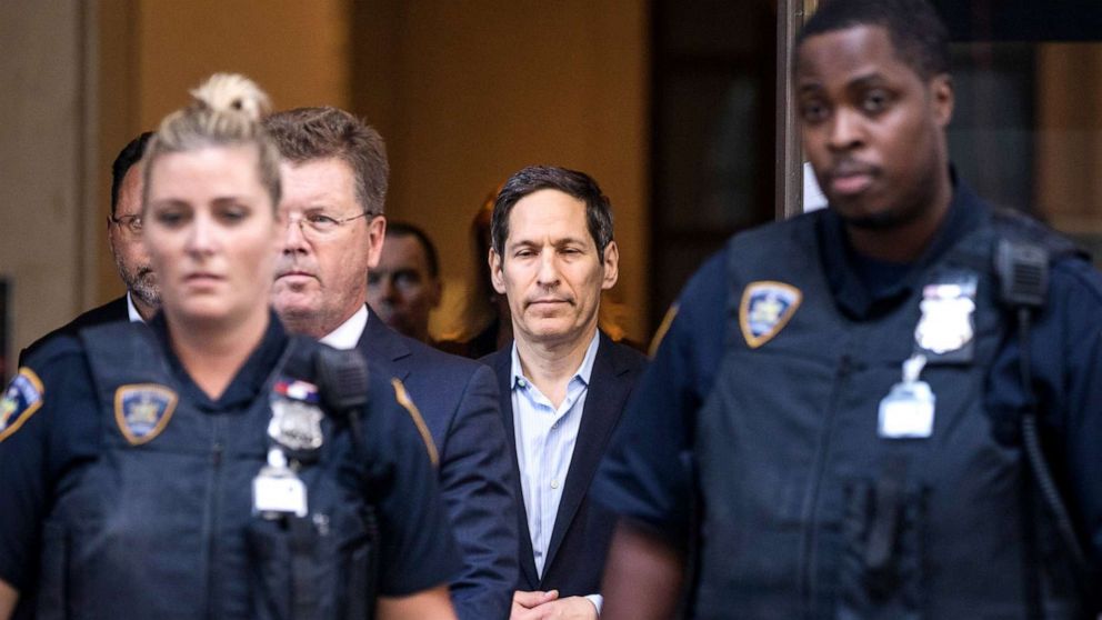 PHOTO: Tom Frieden (center), former Director of the Centers for Disease Control and Prevention, exits Brooklyn Criminal Court following his arrest on sex abuse charges, Aug. 24, 2018, in New York City.