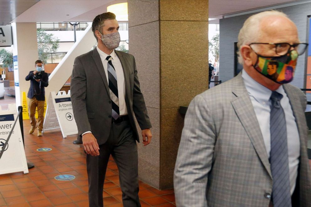 PHOTO: Former Minneapolis Police Officer Thomas Lane enters the Hennepin County Government Center on Tuesday, July 21, 2020, in Minneapolis with his attorney, Earl Gray.