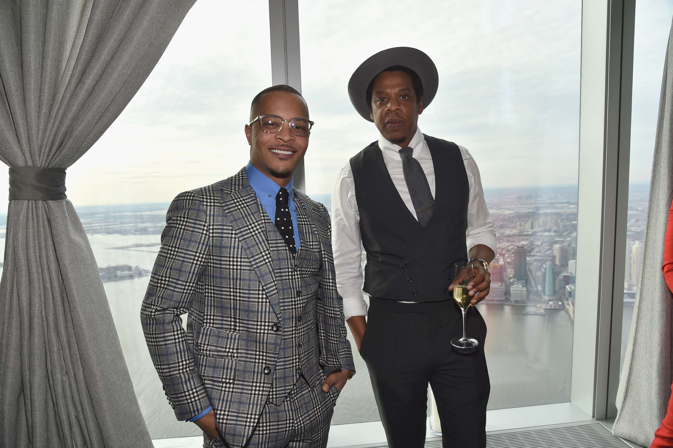 PHOTO: T.I. and Jay-Z attend Roc Nation THE BRUNCH at One World Observatory on Jan. 27, 2018 in New York City. 