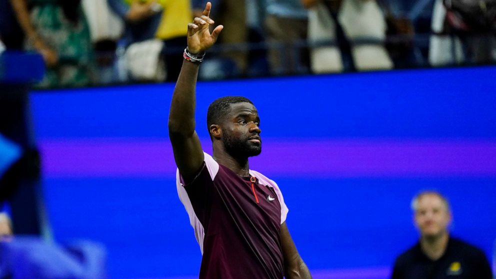 PHOTO: Frances Tiafoe gestures to the crowd after losing to Carlos Alcaraz, of Spain, in the semifinals of the U.S. Open tennis championships, Sept. 9, 2022, in New York.