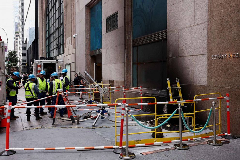 PHOTO: Con Edison personnel work following a fire at the recently renovated Tiffany flagship store on 5th Avenue in New York City, June 29, 2023.