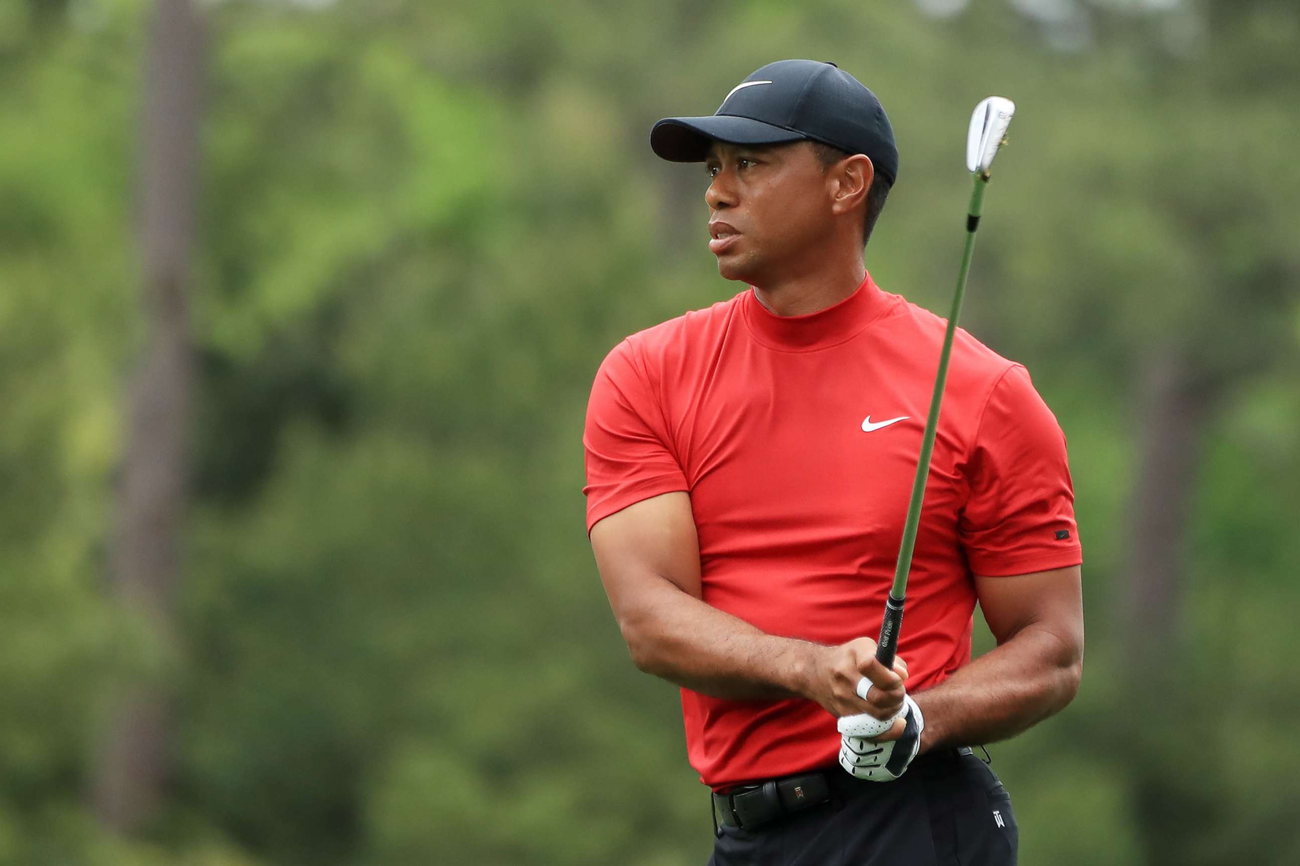 PHOTO: Tiger Woods plays a shot on the first hole during the final round of the Masters, April 14, 2019, in Augusta, Ga. 