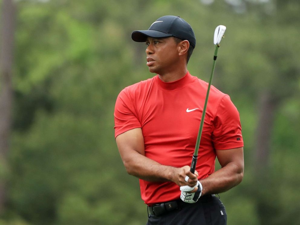 PHOTO: Tiger Woods plays a shot on the first hole during the final round of the Masters, April 14, 2019, in Augusta, Ga.