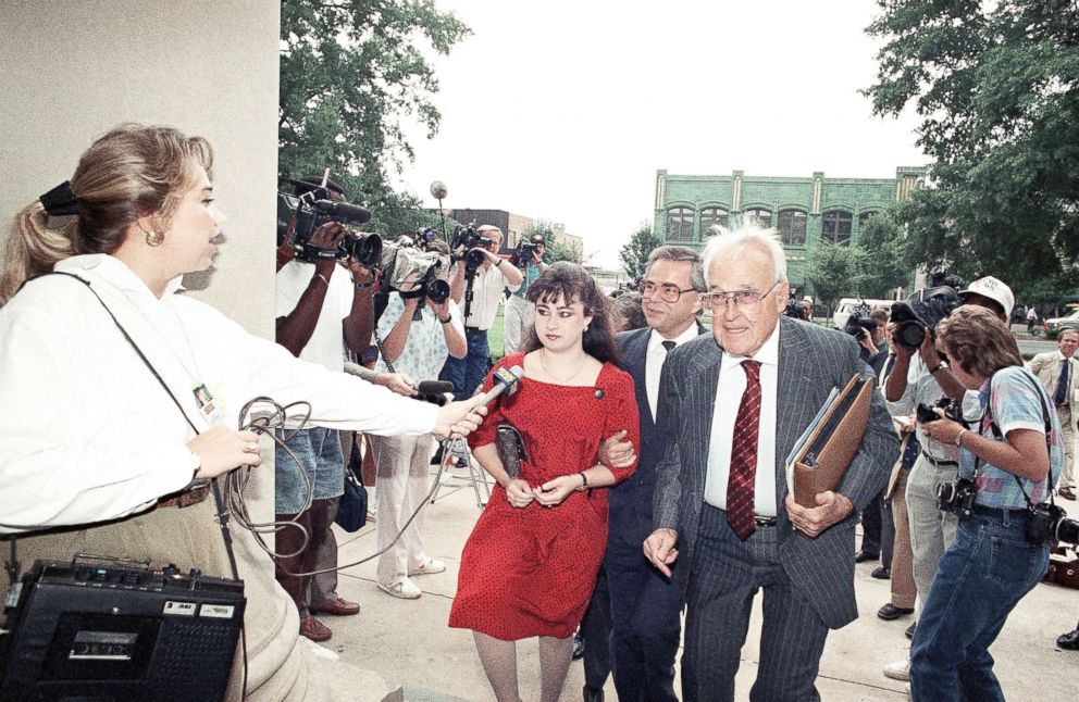 PHOTO: Former PTL leader Jim Bakker, center is flanked by members of the press as he arrives at the Federal Building in Charlotte, N.C., Aug. 22, 1989, with his daughter Tammy Sue Chapman and attorney for jury selection in his trial.