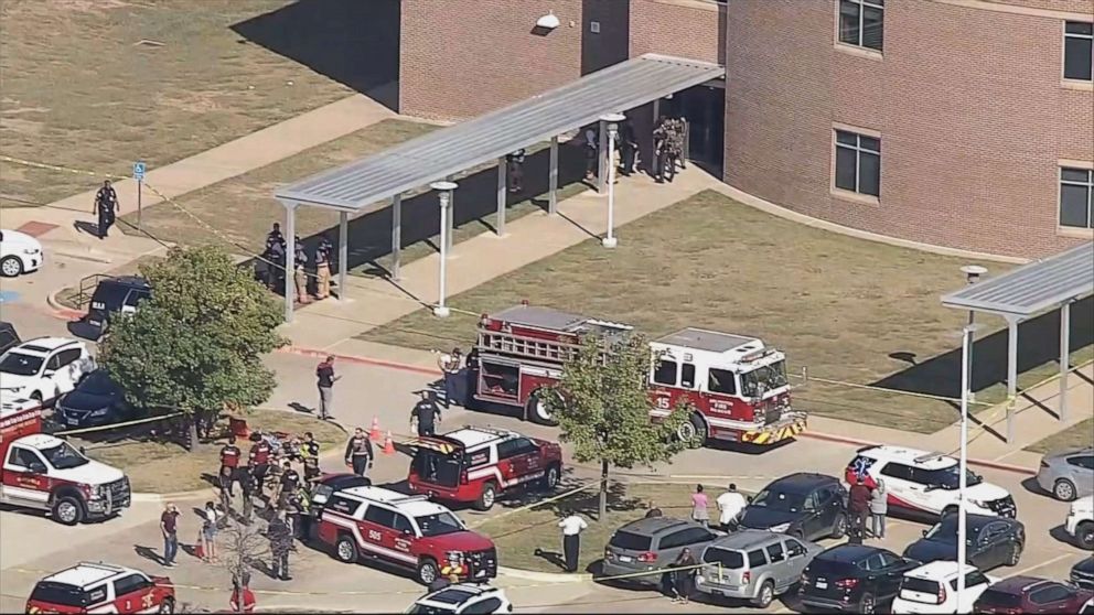 PHOTO: First responders gather outside Timberview High School in in Arlington, Texas, after reports of a shooting, Oct. 6, 2021.