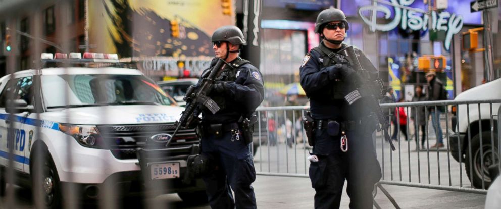 PHOTO: Members of the New York Police Departments Counterterrorism Bureau stand guard before Christmas Eve at Times Square in New York City, Dec.24, 2017.