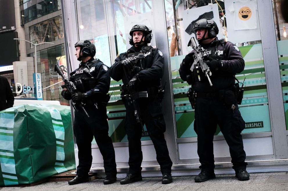 PHOTO: New York City police stand on a corner in Times Square, Dec. 12, 2017, in New York City.